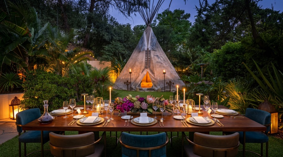 Candlelit outdoor dinner under the teepee